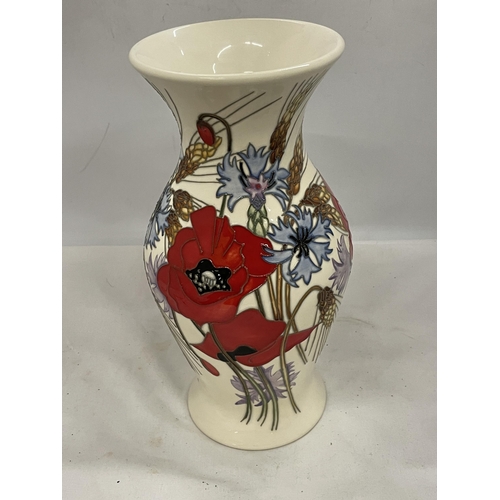 84 - A LARGE MOORCROFT POPPY TRIAL VASE HEIGHT 12