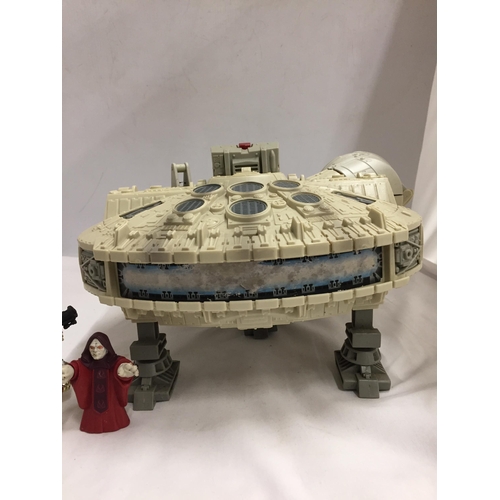 304 - A STAR WARS MILLENIUM FALCON SPACE SHIP WITH FOUR FIGURES