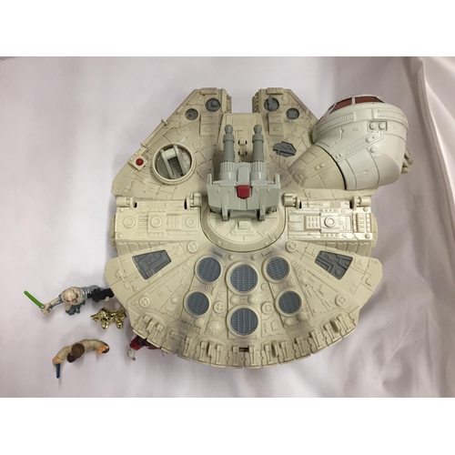 304 - A STAR WARS MILLENIUM FALCON SPACE SHIP WITH FOUR FIGURES