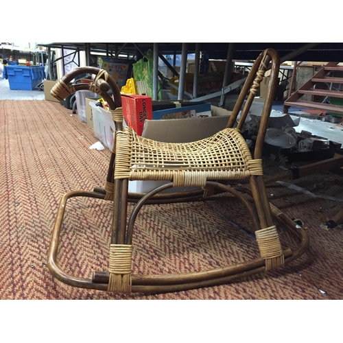 314 - A VINTAGE WOODEN CHILD'S HORSE ROCKER, A WICKER HORSE ROCKER PLUS A CHILD'S SHOPPING TROLLEY