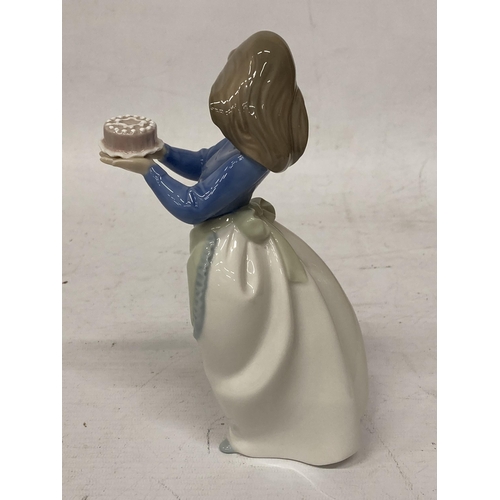 987A - A NAO FIGURINE OF A GIRL WITH A BIRTHDAY CAKE AND PUPPY