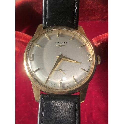 710A - A VINTAGE LONGINES GENTLEMAN'S WRIST WATCH WITH 9 CARAT GOLD CASE, SILVERISED DIAL AND ORIGINAL CASE