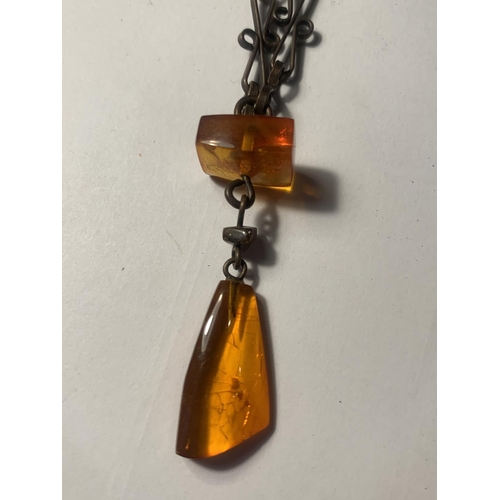 720A - THREE VINTAGE POSSIBLY AMBER NECKLACES