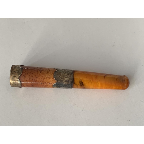 861 - AN AMBER AND HALLMARKED BIRMINGHAM SILVER CHEROOT HOLDER AND A HALLMARKED LONDON SILVER CIGAR CUTTER