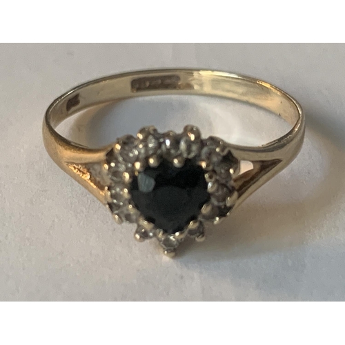 866 - A 9 CARAT GOLD RING WITH CENTRE HEART SHAPED SAPPHIRE SURROUNDED BY DIAMONDS SIZE O/P GROSS WEIGHT 1... 