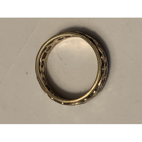 873 - A 9 CARAT GOLD BAND WITH RUBYS AND DIAMONDS SIZE M GROSS WEIGHT 3.4 GRAMS