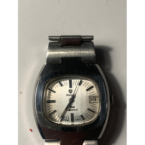 898 - A VINTAGE NIVADA WRIST WATCH WITH ORIGINAL BRACELET. MANUAL SEEN WORKING BUT NO WARRANTY