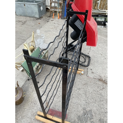 1708 - A DECORATIVE METAL 49 BOTTLE WINE RACK