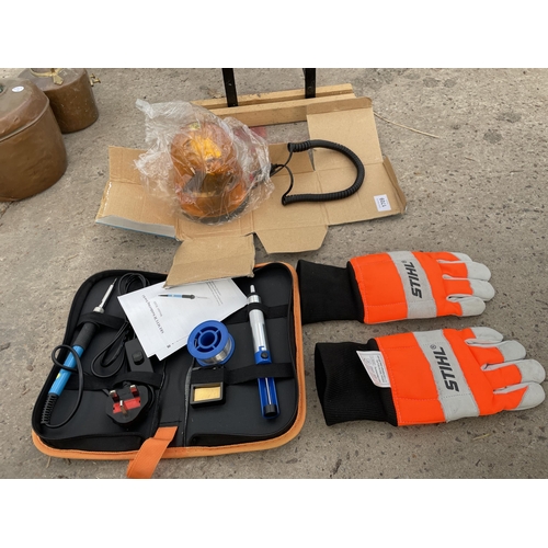 1709 - AN ASSORTMENT OF ITEMS TO INCLUDE STIHL CHAINSAW GLOVES, A SOLDERING KIT AND A FLASH LIGHT ETC