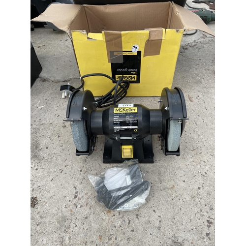 1710 - AN AS NEW AND BOXED MCKELLER BENCH GRINDER