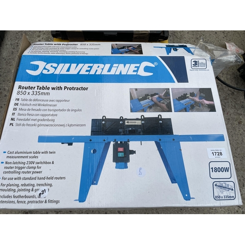 A BOXED SILVERLINE ROUTER TABLE AND A TILE CUTTER
