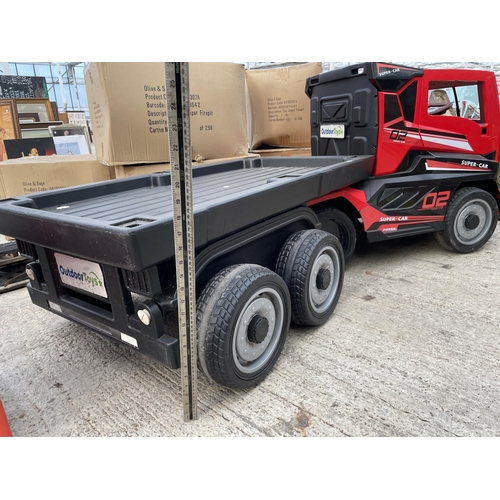 1748 - A 'SUPER CAR' BATTERY POWERED CHILDS RIDE ALONG BATTERY WAGON AND TRAILER COMPLETE WITH CHARGER, WOR... 