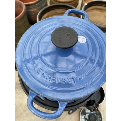 1787 - A PAN STAND WITH AN ASSORTYMENT OF PANS TO INCLUDE THREE BLUE LE CREUSET