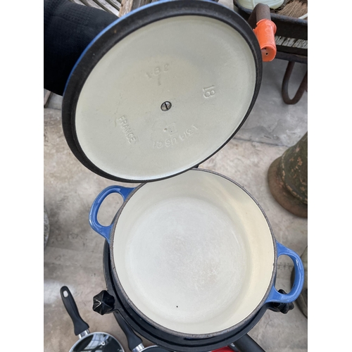 1787 - A PAN STAND WITH AN ASSORTYMENT OF PANS TO INCLUDE THREE BLUE LE CREUSET