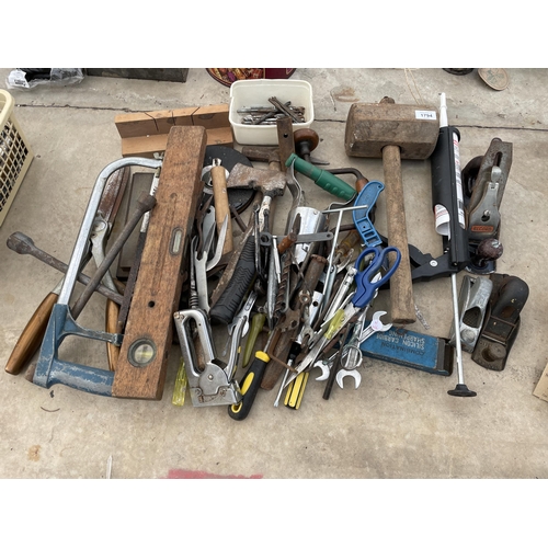 1794 - A LARGE ASSORTMENT OF HAND TOOLS TO INCLUDE SPANNERS, AN AXE AND WOOD PLANES ETC