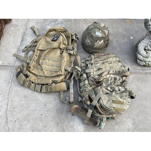 1813 - TWO CAMMO BAGS AND A CAMMO HELMET