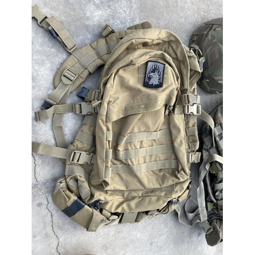 1813 - TWO CAMMO BAGS AND A CAMMO HELMET