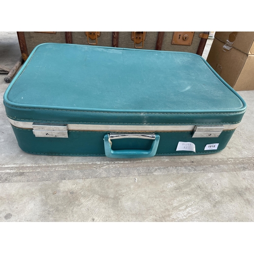 1818 - A LARGE VINTAGE TRAVEL TRUNK AND A RETRO SUITCASE