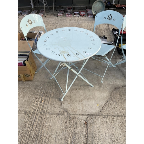 1842 - A MODERN METALWARE PAINTED FOLDING PATIO TABLE AND TWO CHAIRS