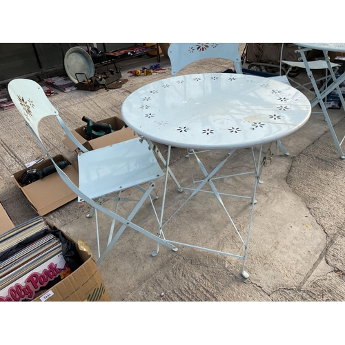 1842 - A MODERN METALWARE PAINTED FOLDING PATIO TABLE AND TWO CHAIRS