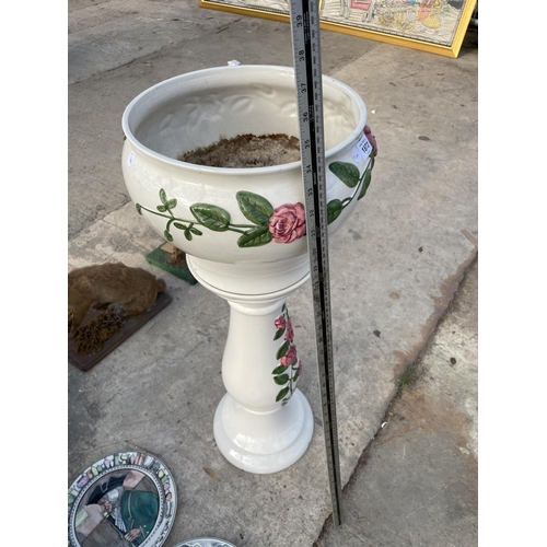 1872 - A DECORATIVE CERAMIC JARDINAIRE AND STAND