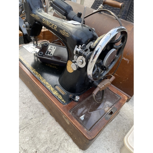 1882 - AN ELECTRIC SINGER SEWING MACHINE WITH FOOT PEDAL AND WOODEN CARRY CASE