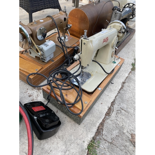 1883 - TWO ALFA ELECTRIC SEWING MACHINES BOTH WITH FOOT PEDALS