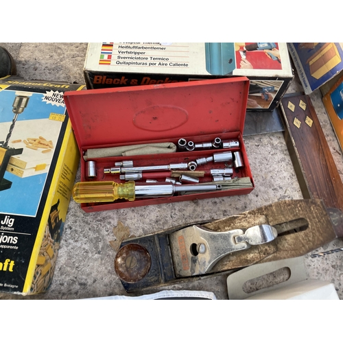 1893A - AN ASSORTMENT OF TOOLS TO INCLUDE TWO DRILLS AND HEAT GUNS ETC