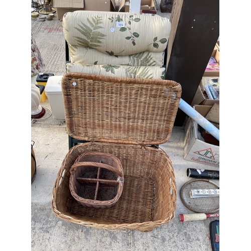 1910 - TWO WICKER BASKETS AND A FOLDING GARDEN CHAIR WITH CUSHION