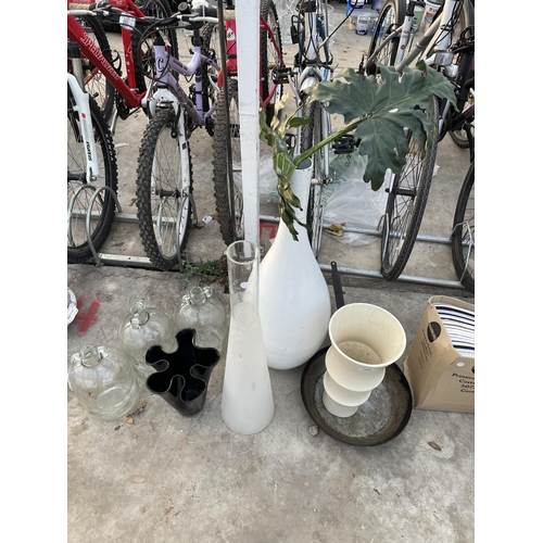 1950 - AN ASSORTMENT OF GLASS VASES AND THREE DEMI JOHNS ETC