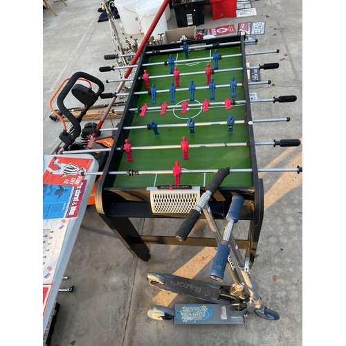 2093 - A CHILDS TABLE FOOTBALL AND TWO SCOOTERS