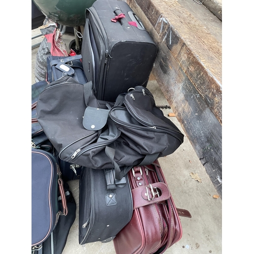 2098 - A LARGE ASSORTMENT OF SUITCASES, HOLDALLS AND TRAVEL CASES ETC