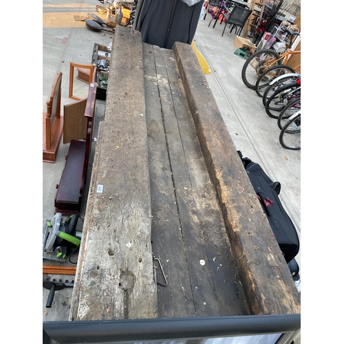 2102 - A LARGE VINTAGE WOODEN WORK BENCH