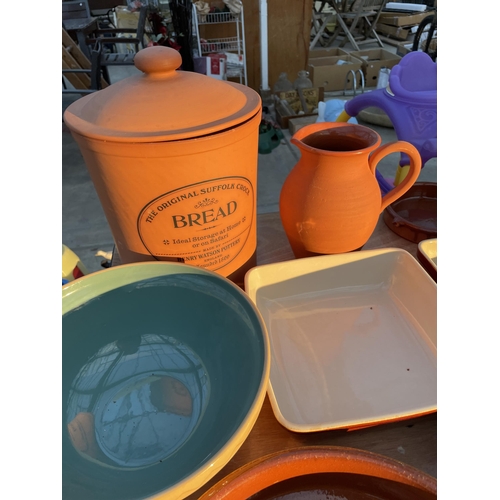 2109 - AN ASSORTMENT OF STONEWARE ITEMS TO INCLUDE A BREAD BIN, JUG AND DISHES ETC