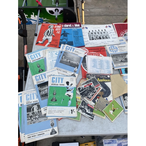 2113 - A LARGE ASSORTMENT OF FOOTBALL PROGRAMMES TO INCLUDE MANCHESTER CITY ETC