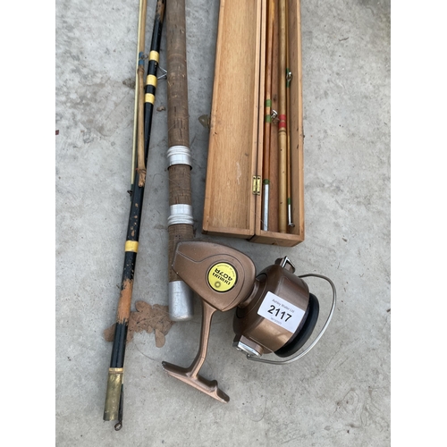 2117 - AN ASSORTMENT OF FISHING RODS AND A FISHING REEL