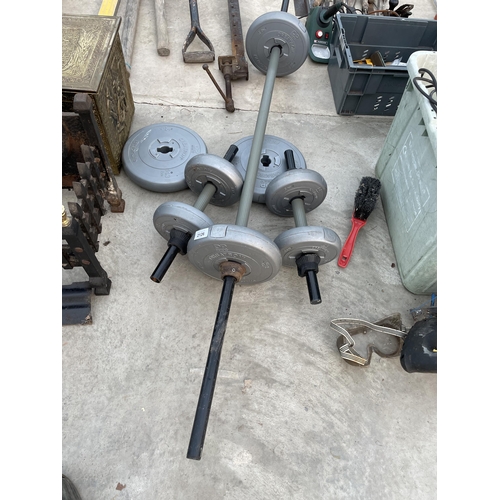 2126 - A WEIGHT LIFTING BAR AND DUMB BELLS