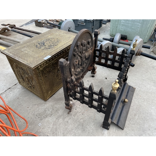 2127 - A DECORATIVE CAST FIRE GRATE AND A BRASS COAL BOX