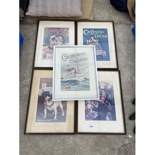 2130 - AN ASSORTMENT OF FRAMED ADVERTISING PRINTS