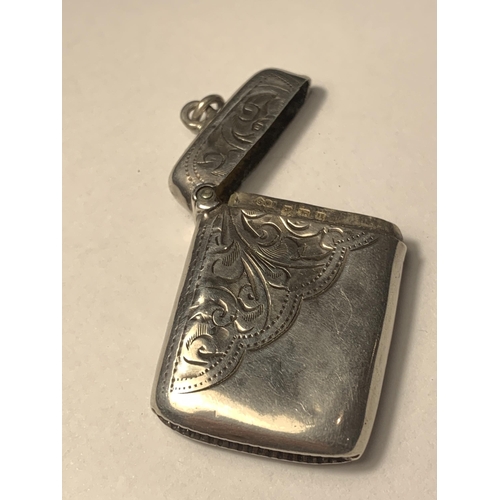 710 - A HALLMARKED BIRMINGHAM SILVER VESTA CASE