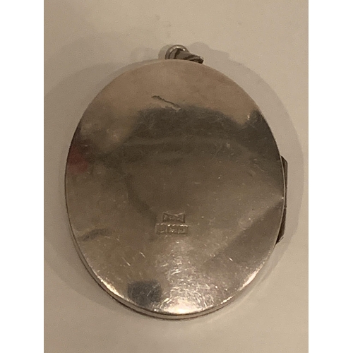 833 - A HALLMARKED BIRMINGHAM SILVER LARGE OVAL LOCKET