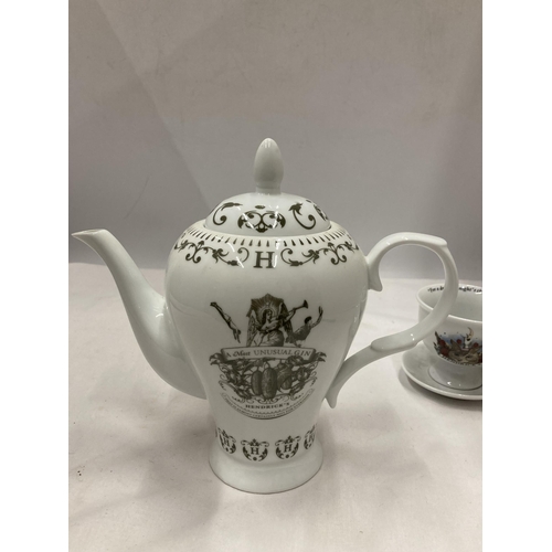 699A - A HENDRICKS TEAPOT AND CUP AND SAUCER