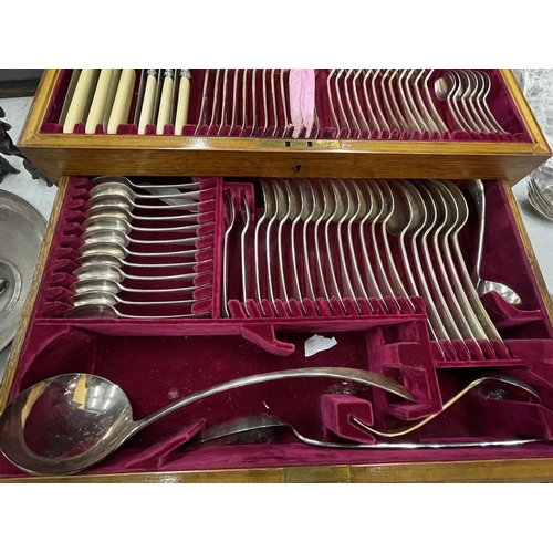 81 - A LARGE OAK CASED NINETY TWO PIECE CANTEEN OF CUTLERY