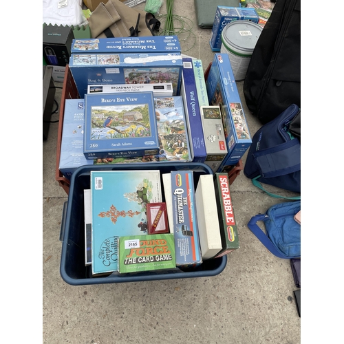 2165 - A LARGE ASSORTMENT OF GAMES AND JIGSAW PUZZLES