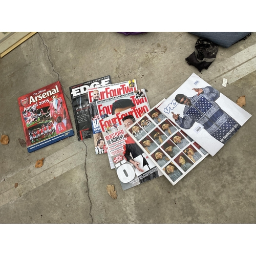 2236 - AN ASSORTMENT OF SPORTS MAGAZINES AND TENNIS RACKETS ETC