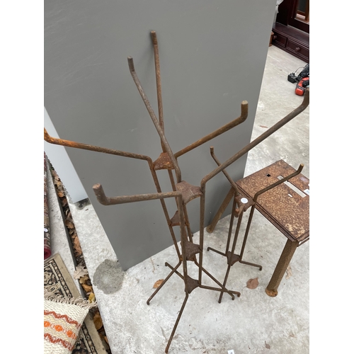 2245 - A METAL STOOL AND THREE METAL SHOP DISPLAY STANDS