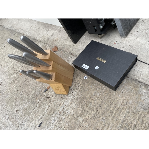 2251 - A JEAN PATRIQUE KNIFE SET AND A SHARPAL KNIFE SHARPENING SET