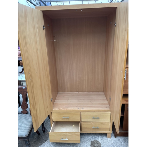 2906 - A MODERN TWO DOOR WARDROBE WITH FOUR DRAWERS TO THE BASE, 40