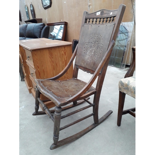 2925 - A LATE VICTORIAN BEECH FRAMED ROCKING CHAIR