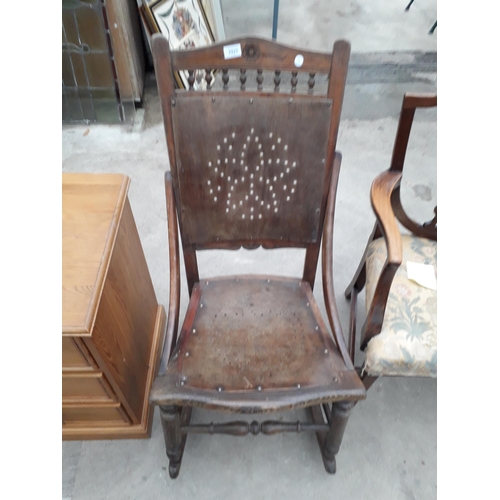 2925 - A LATE VICTORIAN BEECH FRAMED ROCKING CHAIR